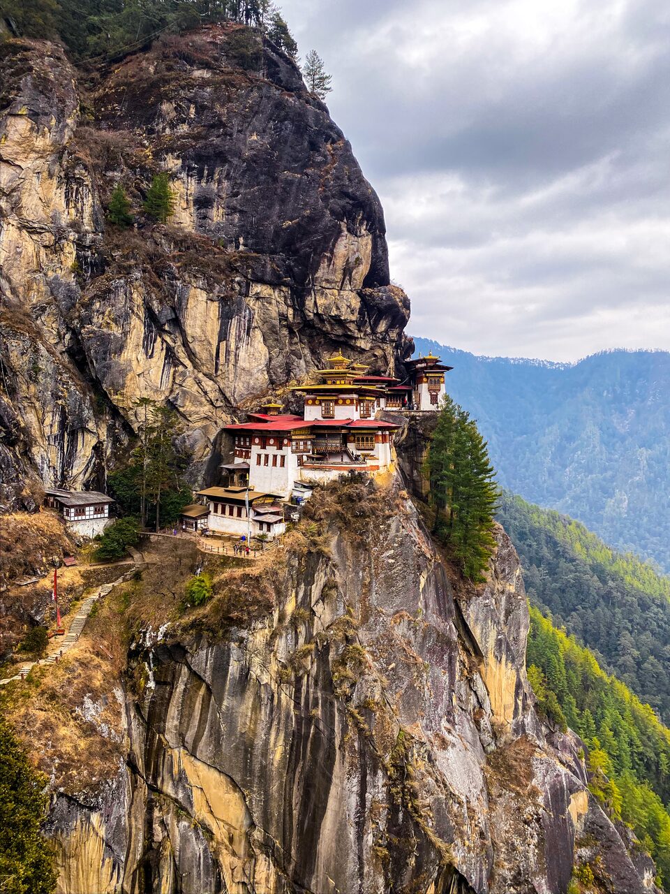 Club dVIN members at Tiger's Nest Monastery during the Bhutan wine harvest experience